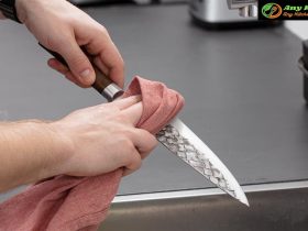 When must a knife be cleaned and sanitized
