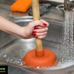 How to unclog a kitchen sink with standing water