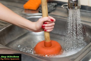 How to unclog a kitchen sink with standing water